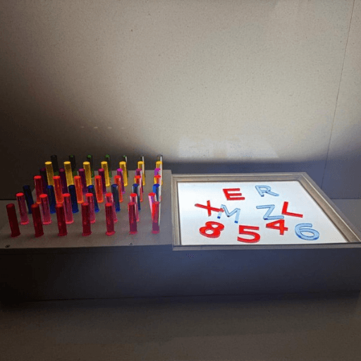 Explore our LED Peg Board with an illuminated alphabet and number panel for interactive visual learning, letter recognition, and educational activities.